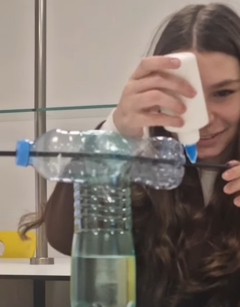 How can we transform motion energy into useful work?